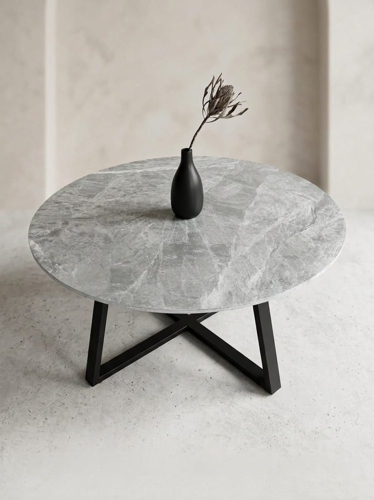 Modern Round Coffee Table (marbled pattern top surface with black metal pedestal style base)